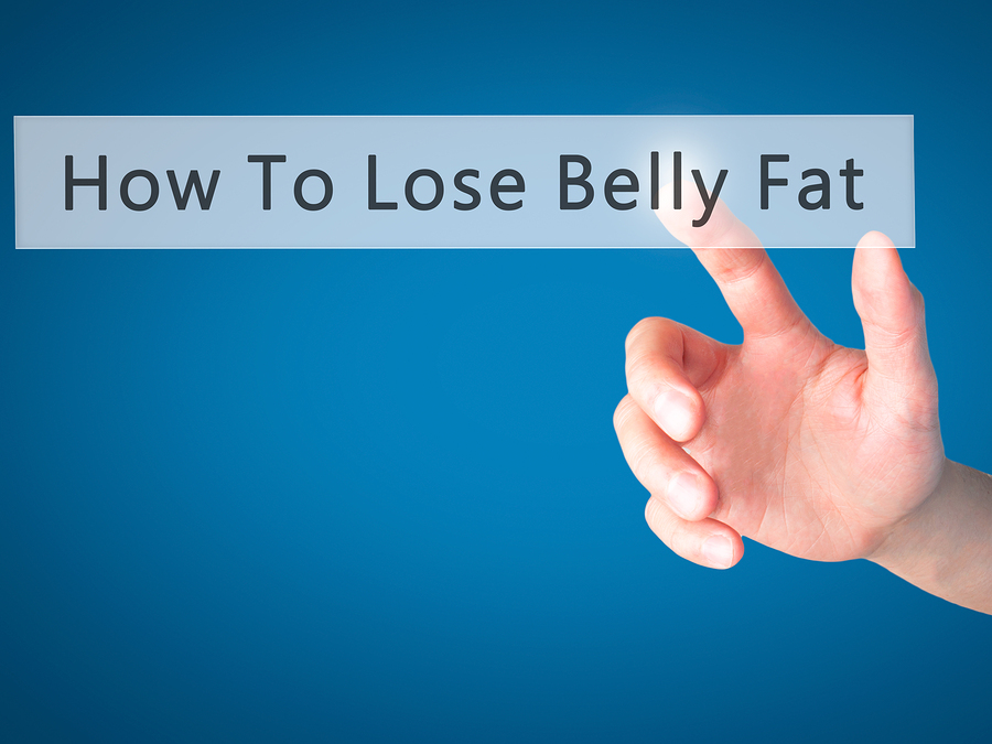 How To Lose Belly Fat - Hand Pressing A Button On Blurred Backgr